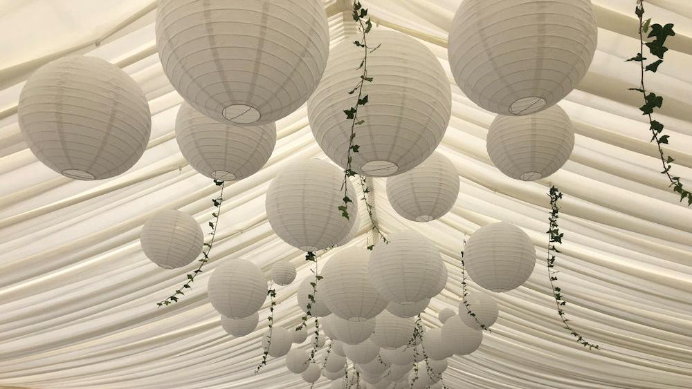 White Paper Lanterns at a Pure White Wedding Hanging Lantern Company